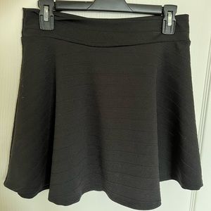 Black mid thigh skirt